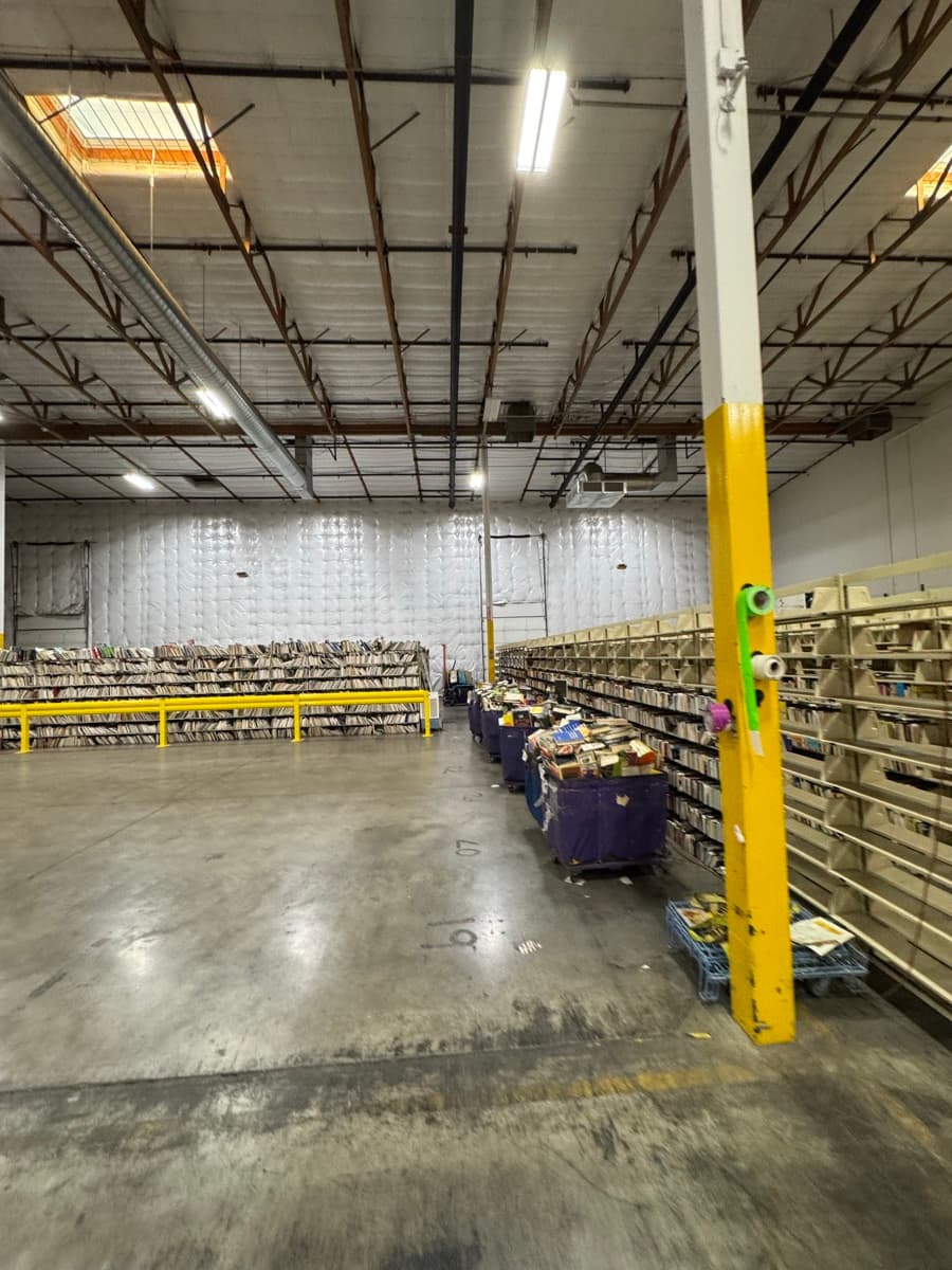 Sorted books on shelves ready for wholesale purchase