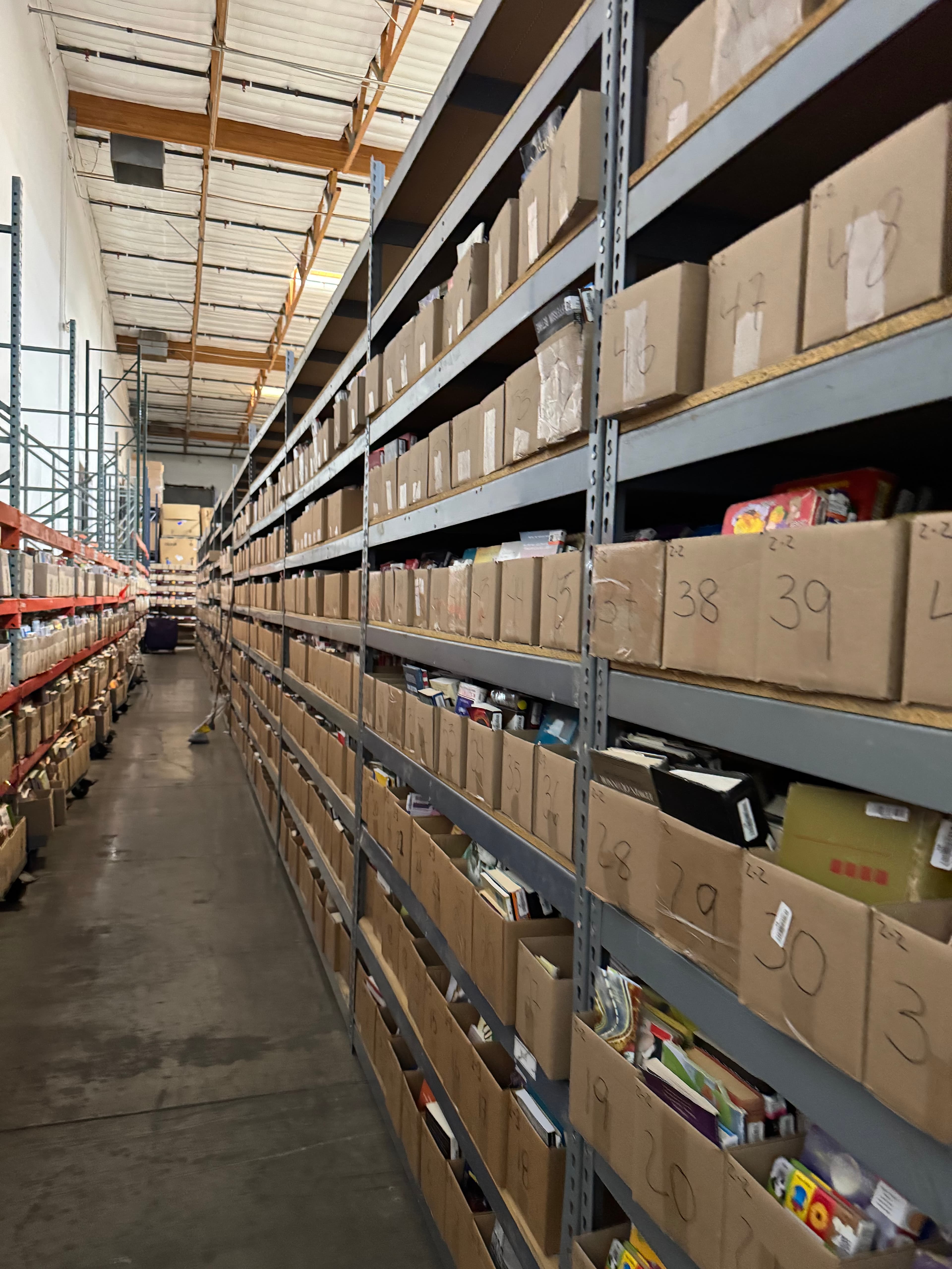 Rows of sorted used books ready for wholesale purchase